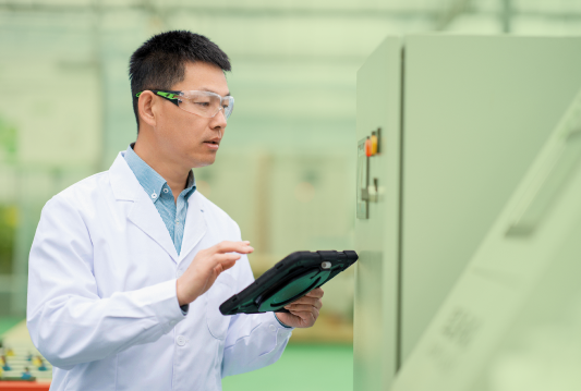 An employee is reviewing and WHMIS 2015 MSDS