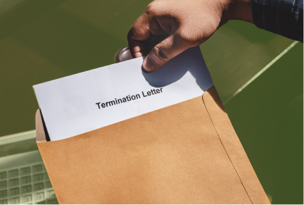 A termination letter in a Manila envelope.