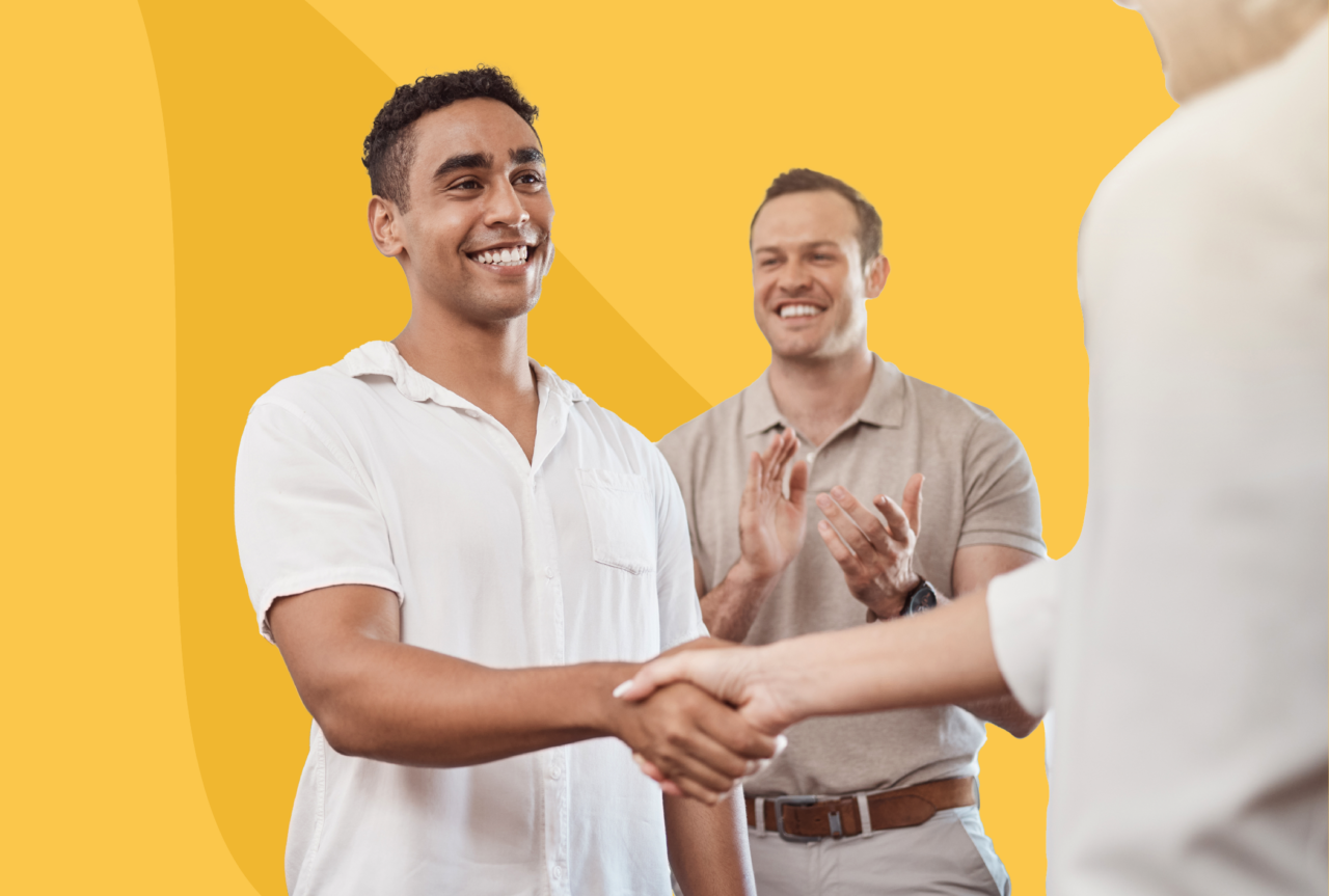 An employee is being rewarded as part of the company's employee recognition program