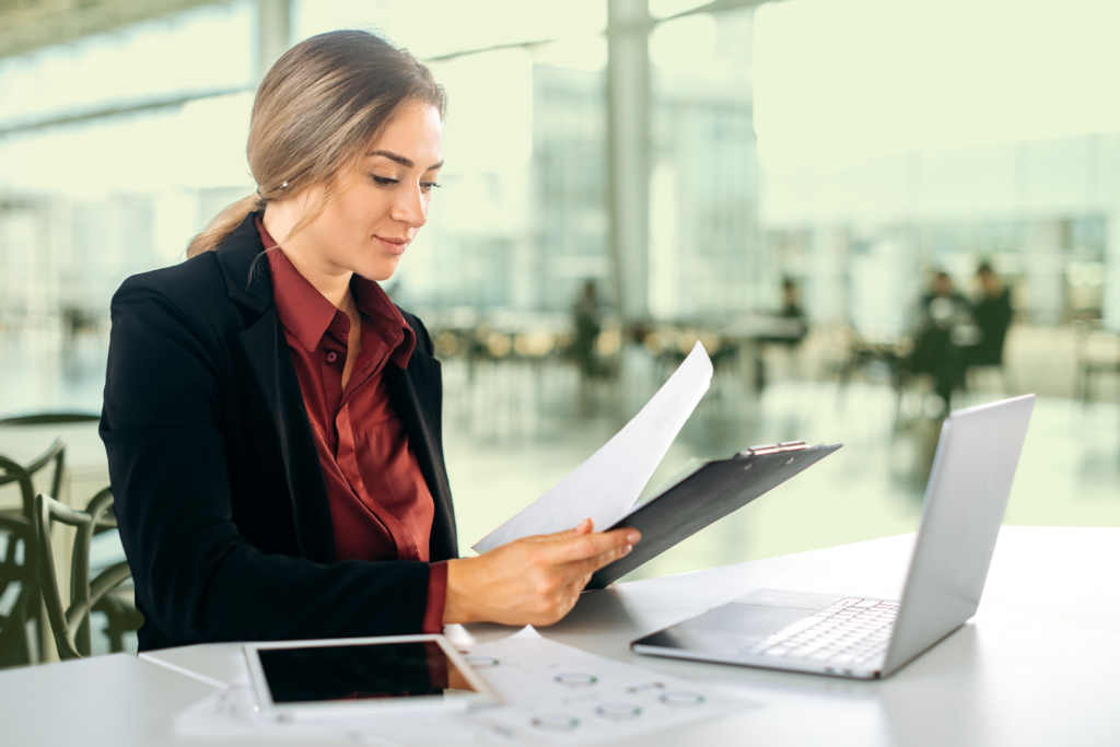 Woman writing document