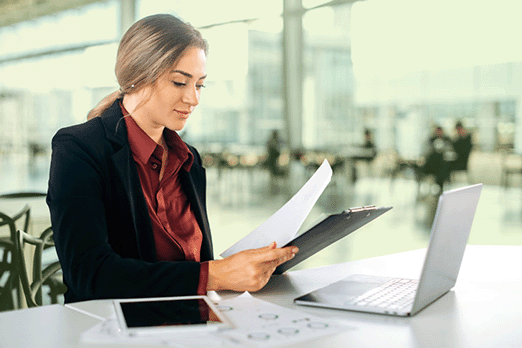 Woman writing document