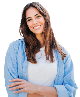 Young woman smiling at camera with her arms crossed.