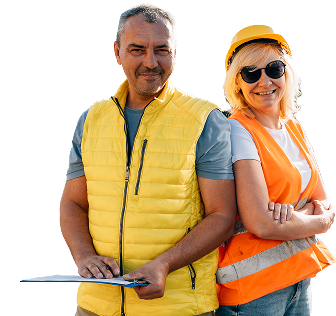 Two health and safety workers in PPE and high visibility vests are holding a clipboard and smiling towards the camera.
