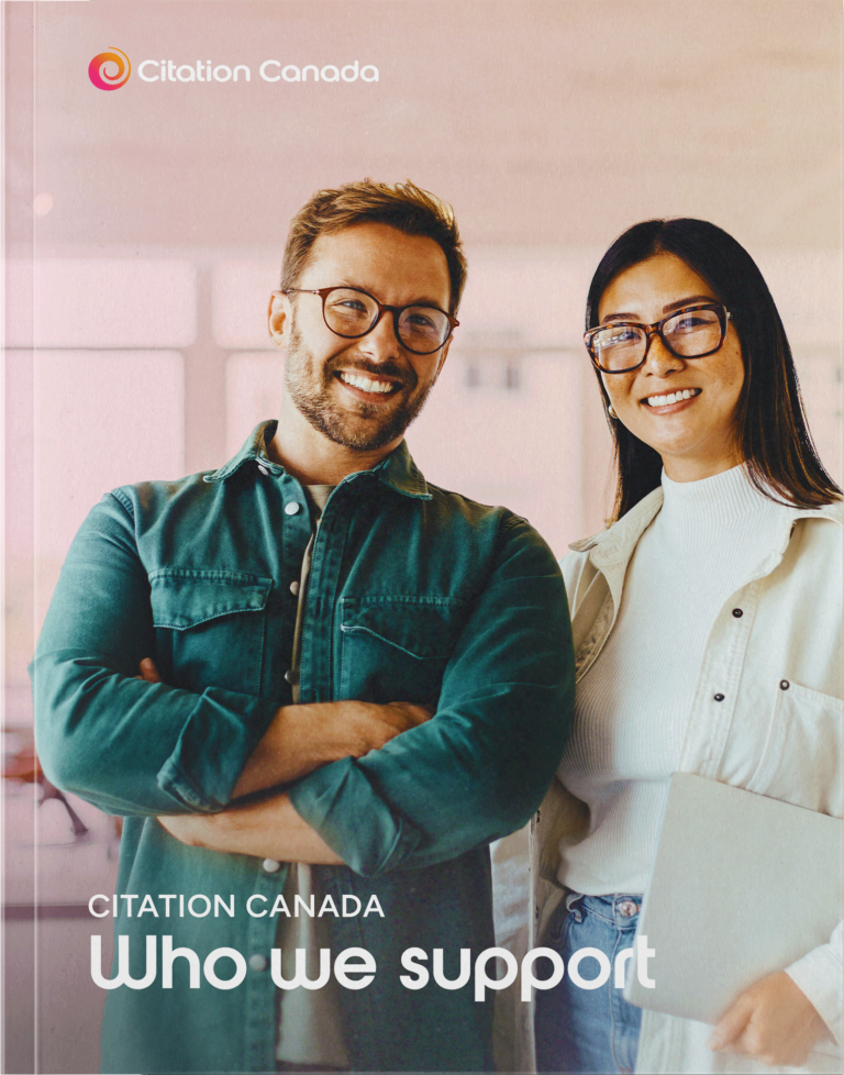 Two employees are standing shoulder to shoulder, smiling. The title of the page "Who we support" is at the bottom of the image.