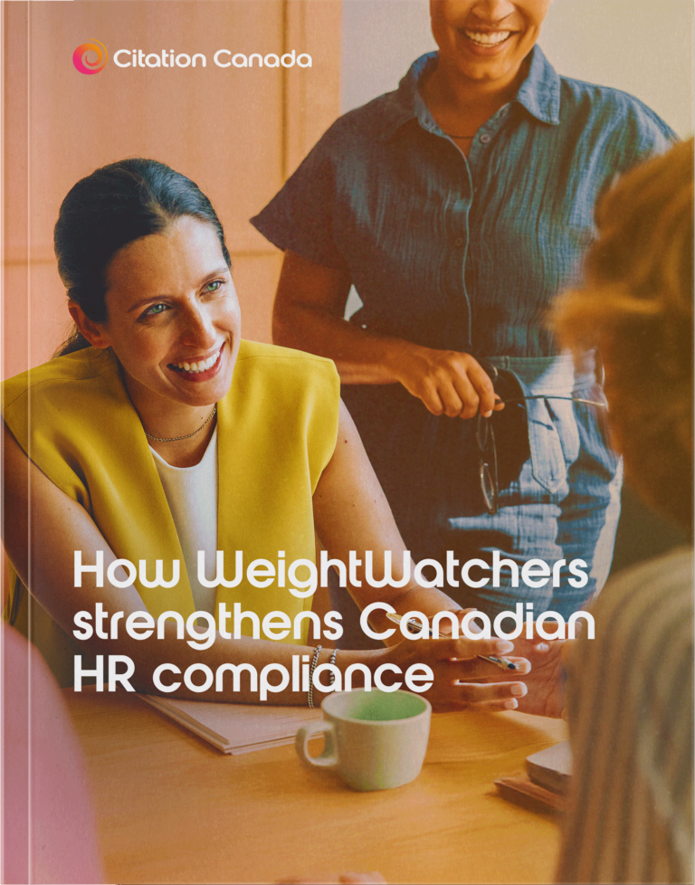 Smiling woman discussing ideas with colleagues around a table